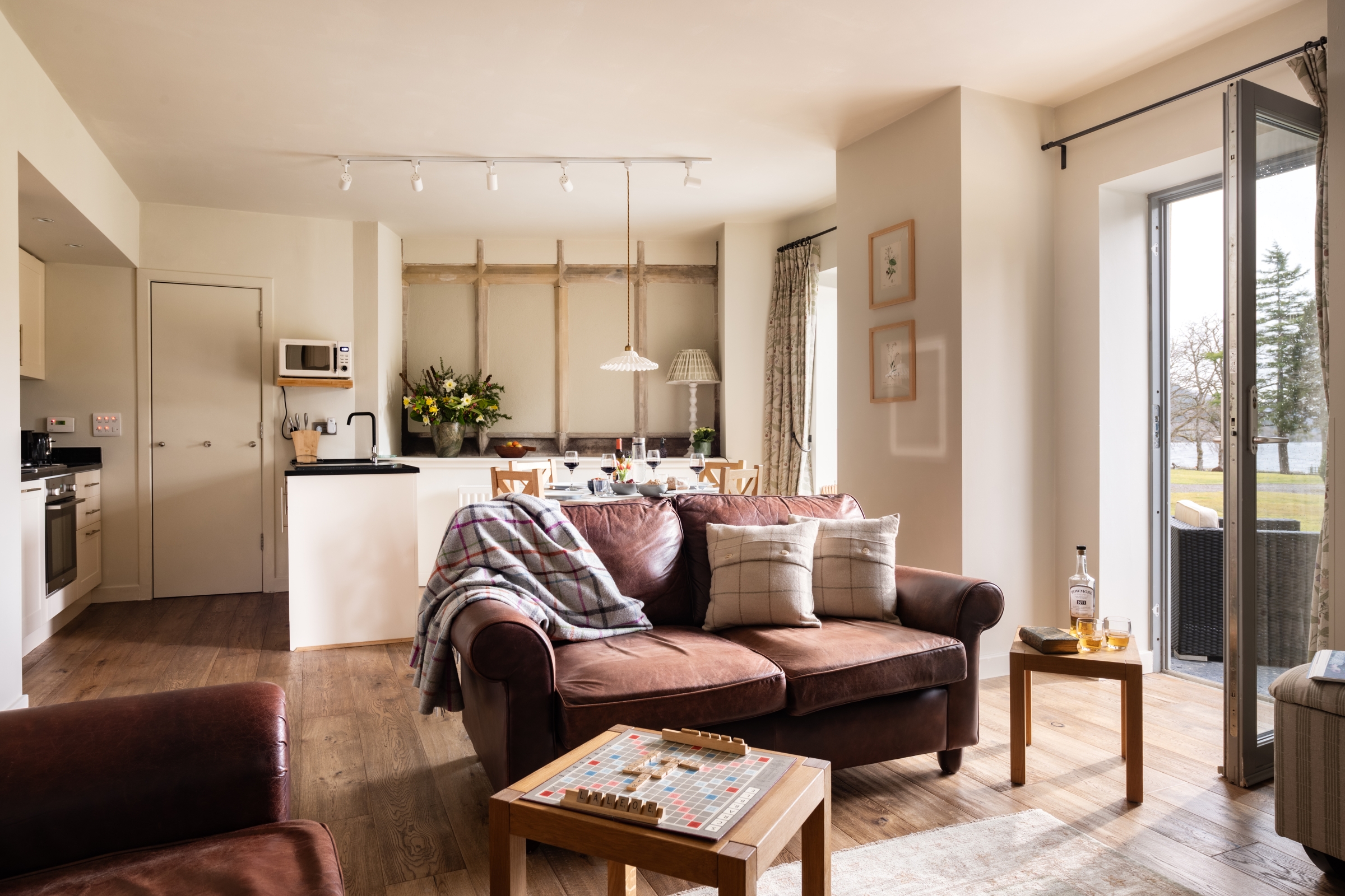 VIEW OVER LOCH NESS FROM THE OPEN PLAN LIVING AREA